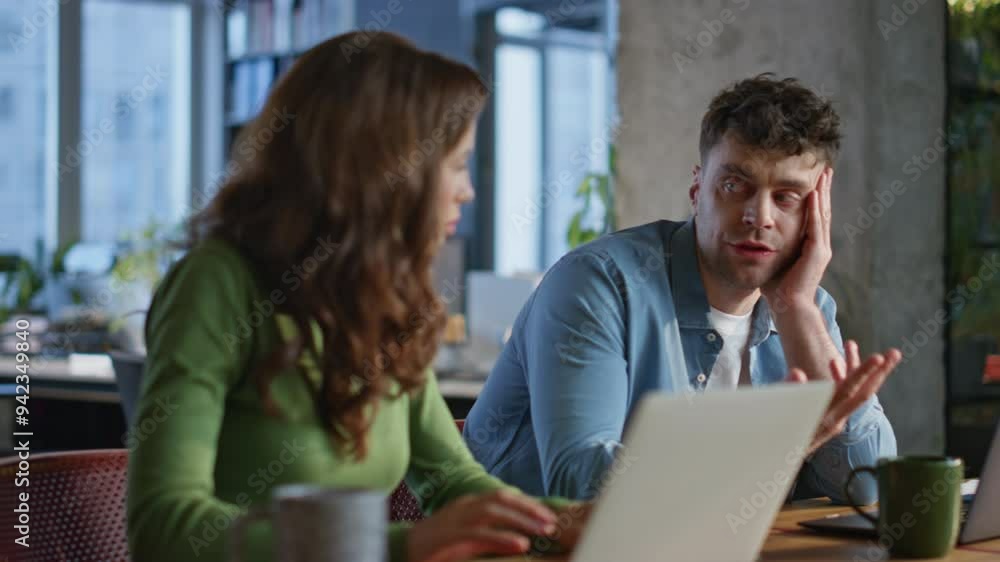 Office manager helping colleague doing work task together at workspace closeup Office manager helping colleague doing work task together at workspace closeup