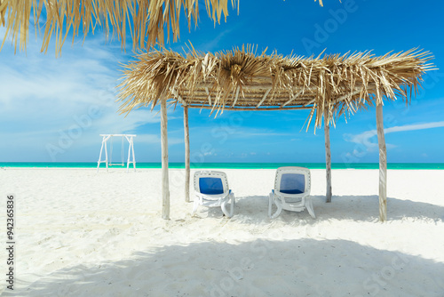 beautiful,magnificent white sand beach, tranquil,turquoise tender ocean, sunny day, clear blue sky, vacation, travel background