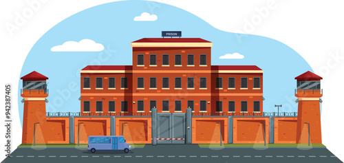 Prison building exterior with watch towers, a bus is passing by on a sunny day