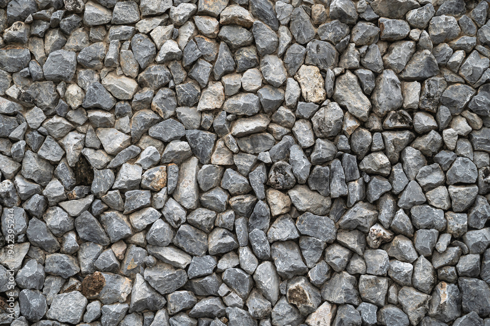 Granite stones wall , stacked stone texture background.
Granite stones wall , stacked stone texture background.