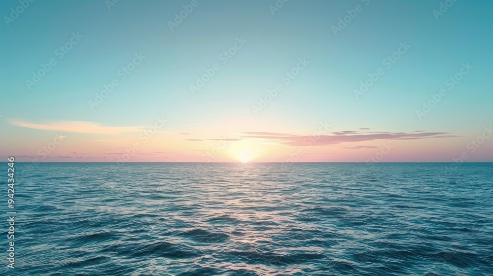 Obraz premium Picturesque horizon sunset over calm ocean with clear blue sky