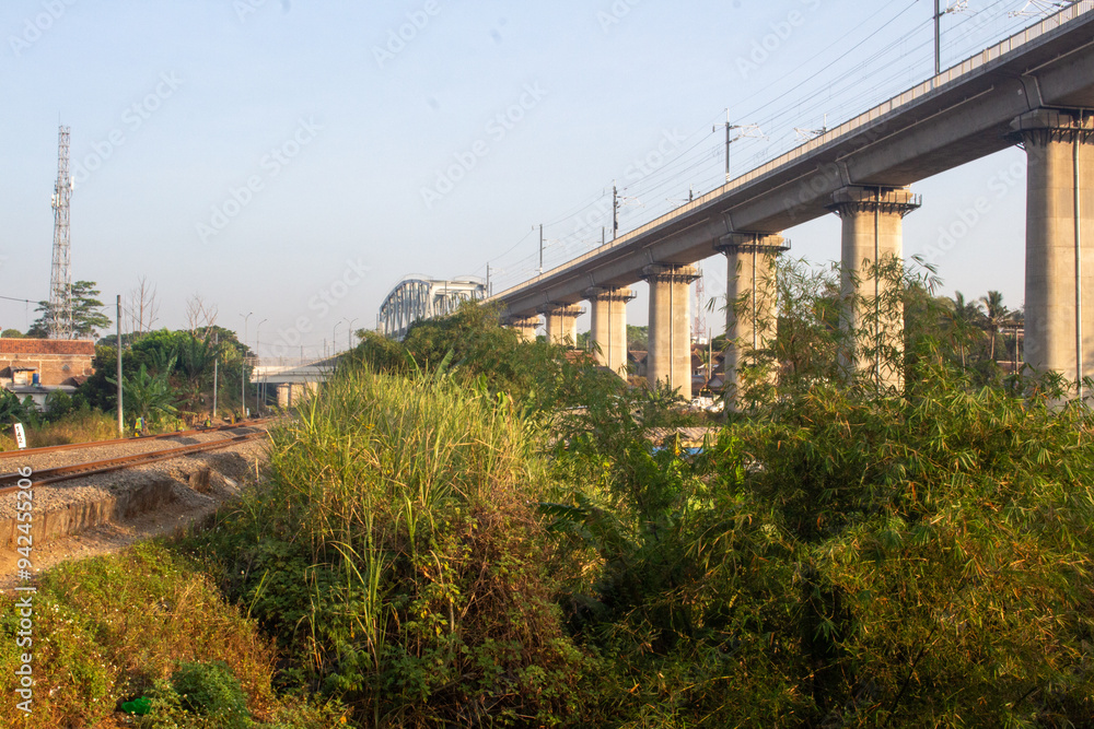 The bridge is a fast train line with the destination Bandung Jakarta The bridge is a fast train line with the destination Bandung Jakarta