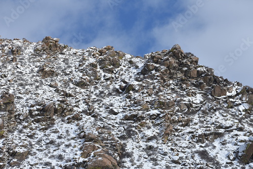 snow-covered rocky mountainsides  