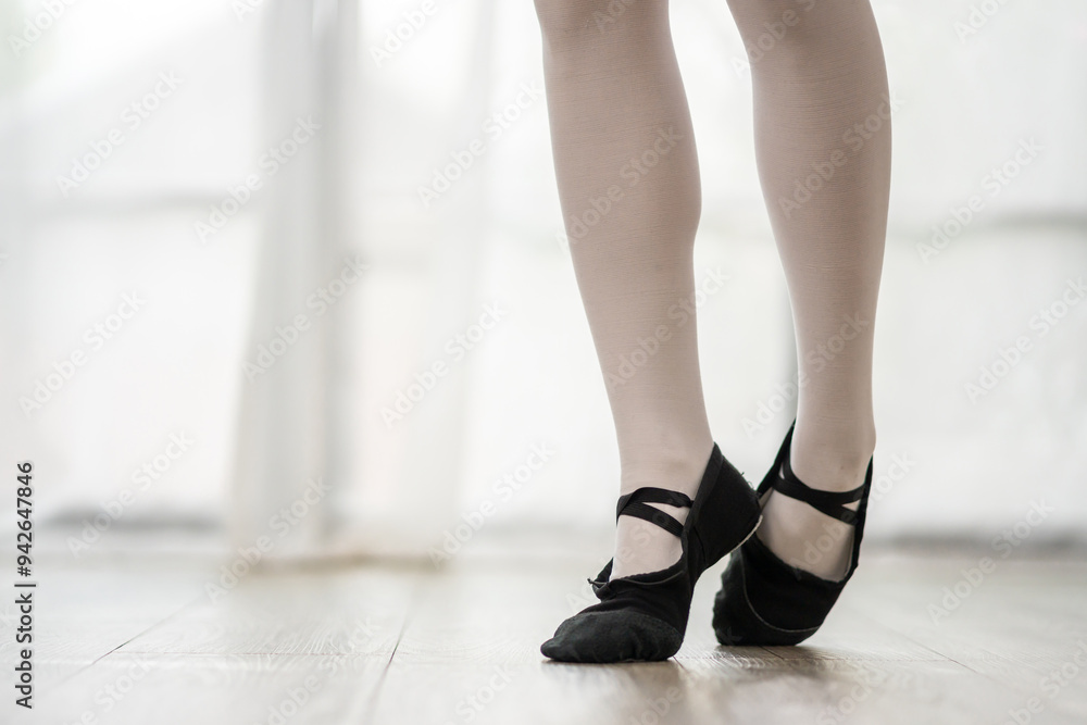 Close up of woman ballet's feet spinning and jumping in tutu and pointe shoes. Close up of woman ballet's feet spinning and jumping in tutu and pointe shoes.