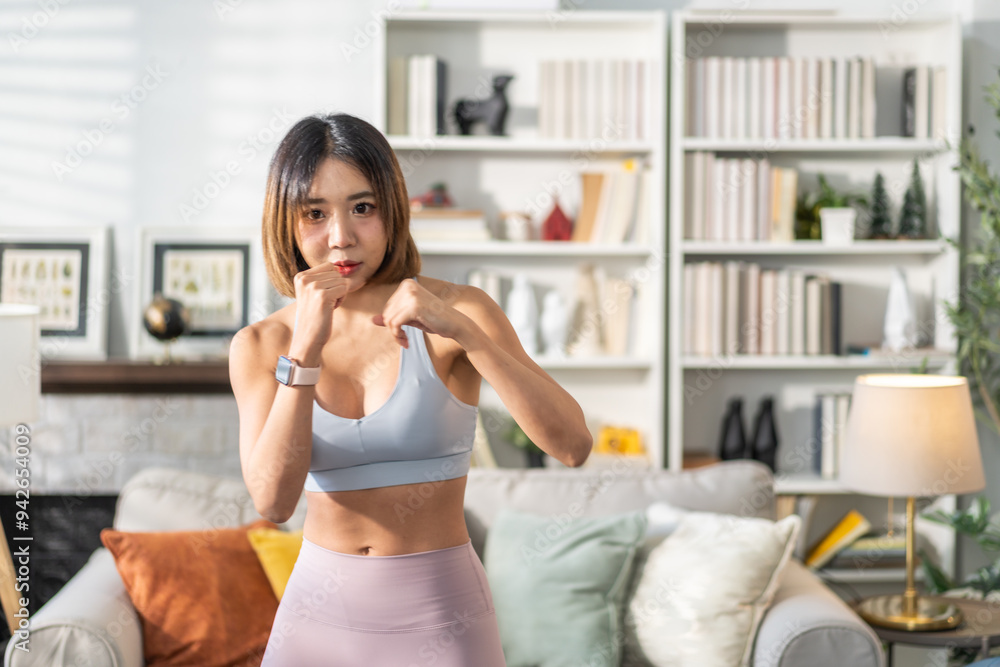 Portrait of sport slim fit strength asian woman training in sportswear relax and practicing yoga, fitness, exercise, wellness, workout, sport at home.Diet concept.Fitness and healthy lifestyle Portrait of sport slim fit strength asian woman training in sportswear relax and practicing yoga, fitness, exercise, wellness, workout, sport at home.Diet concept.Fitness and healthy lifestyle