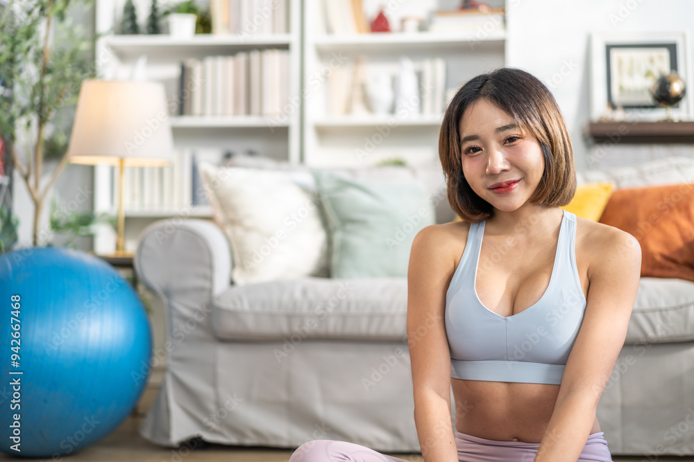 Portrait of sport slim fit strength asian woman training in sportswear relax and practicing yoga, fitness, exercise, wellness, workout, sport at home.Diet concept.Fitness and healthy lifestyle Portrait of sport slim fit strength asian woman training in sportswear relax and practicing yoga, fitness, exercise, wellness, workout, sport at home.Diet concept.Fitness and healthy lifestyle