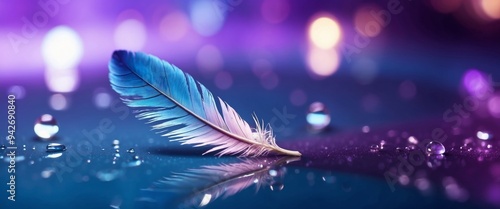 Drop of water on feather on mirror surface macro with sparkling bokeh on blue violet blurred background Abstract romantic delicate magical artistic image in pastel colors, free space. photo