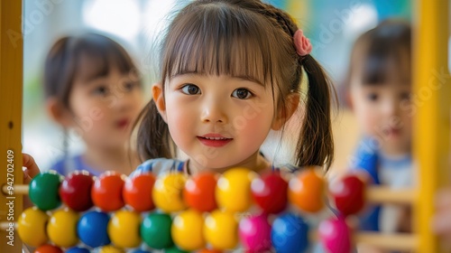 Child Playing with Abacus