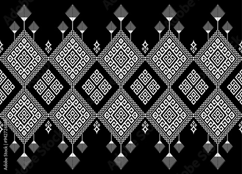Whited diamond-shaped geometric ethnic seamless pattern on black. Designed for fabric textures, textile prints, pillowcases, and other digital prints.