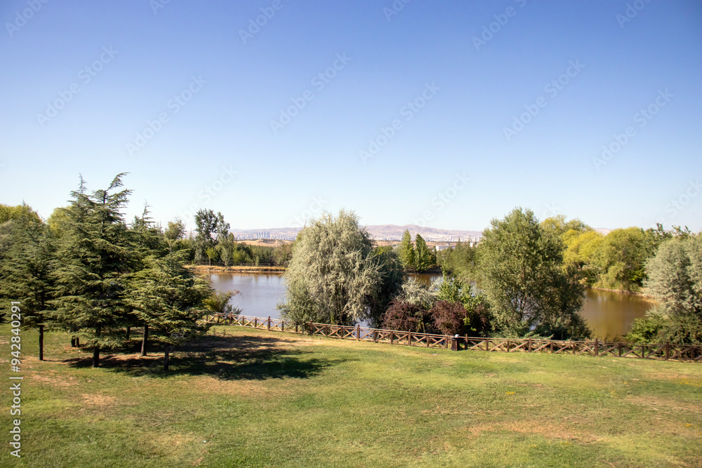landscape with a lake in the background landscape with a lake in the background