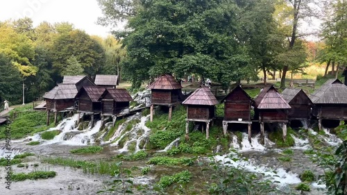 Traditional wooden mills Mlincici near Jajce on Plivsko Lake, Bosnia and Herzegovina photo