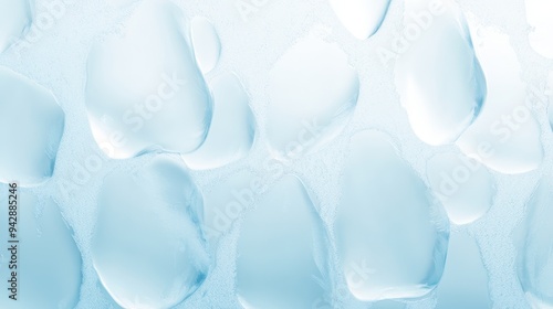A blue background with many small blue shapes. The shapes are all different sizes and are scattered throughout the background