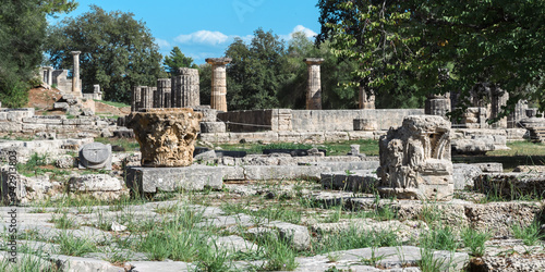 Ancient ruins bask in sunlight. Echoes of Antiquity: Olympia’s Timeless Ruins