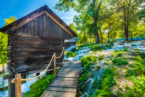 Old wooden mills Mlincici near Jajce on Plivsko Lake, Bosnia and Herzegovina photo