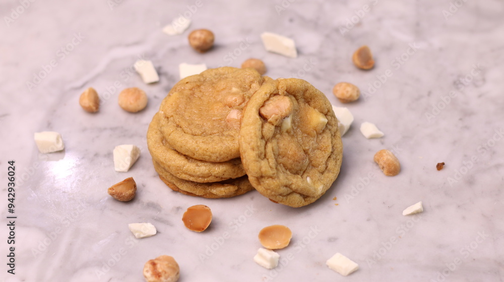 The cookies are golden brown with a slightly crispy edge and a soft, chewy center. Some cookies have chocolate chips The cookies are golden brown with a slightly crispy edge and a soft, chewy center. Some cookies have chocolate chips