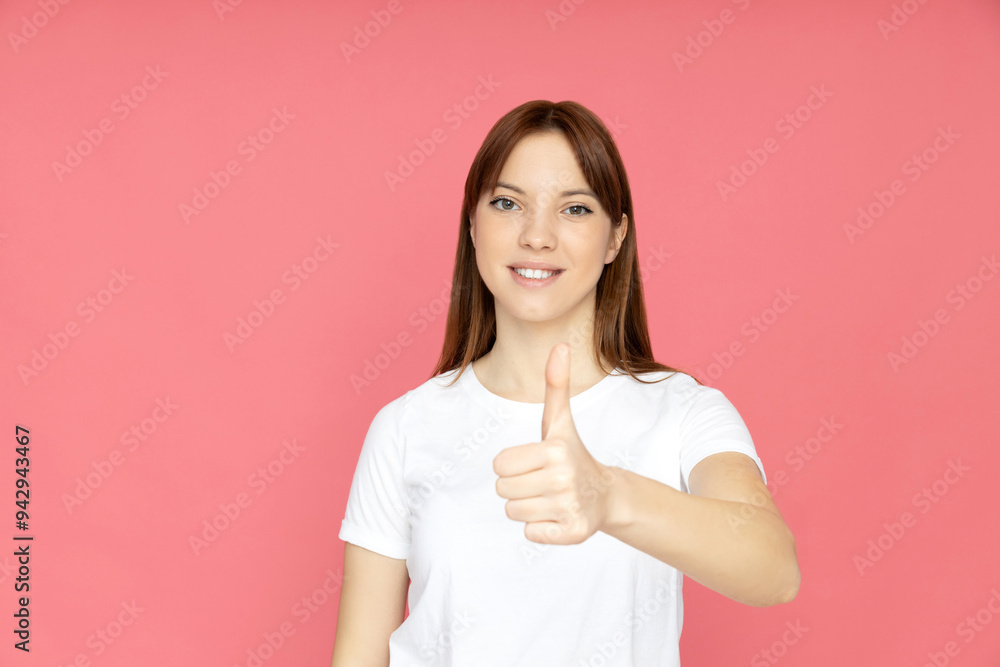 An attractive young girl on a plain background An attractive young girl on a plain background