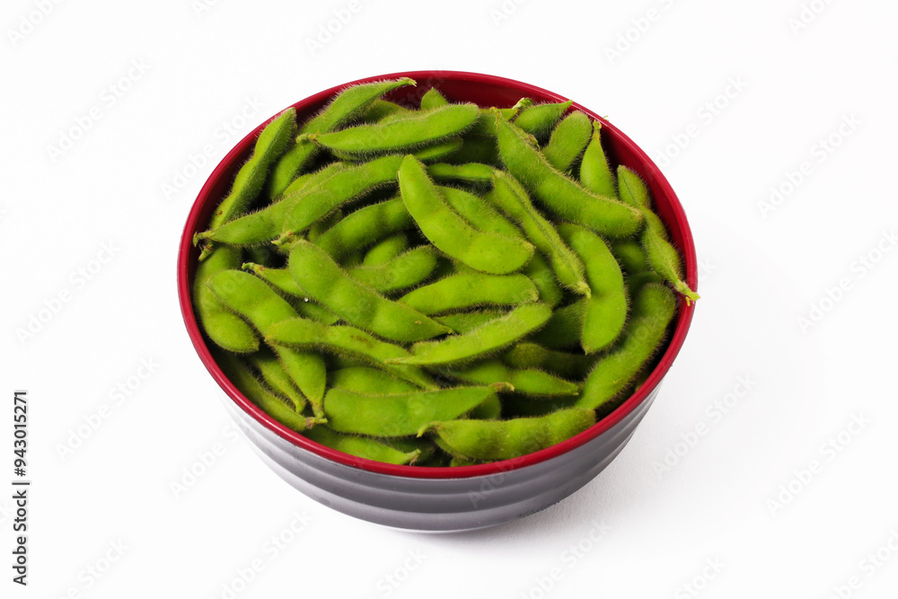 Black Bowl Filled with Vibrant Green Edamame Beans Isolated on White Background Black Bowl Filled with Vibrant Green Edamame Beans Isolated on White Background