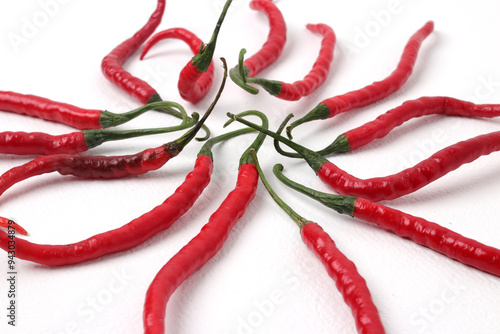 Fresh Curly Red chili peppers (Cabai Merah Keriting) Isolated on a white background photo