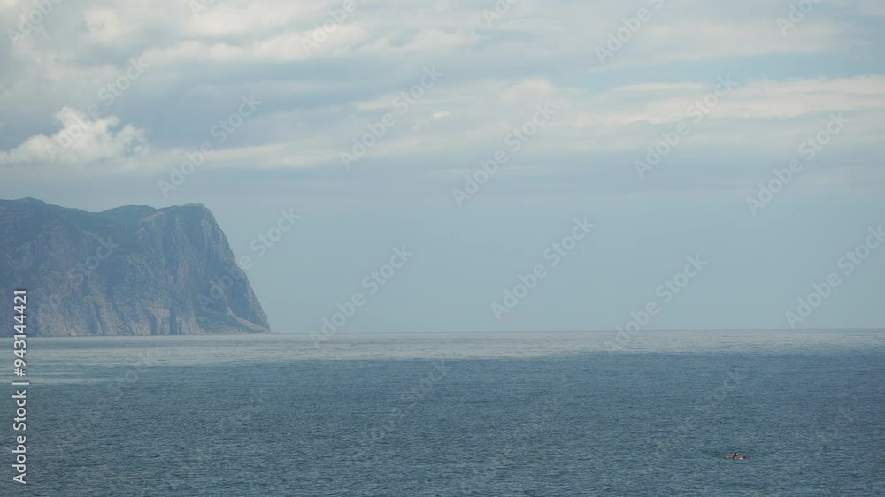Aerial view on calm azure sea and volcanic rocky shores. Small waves on water surface. Nature summer ocean sea beach view. Nobody. Holiday, vacation and travel concept. Weather and climate change Aerial view on calm azure sea and volcanic rocky shores. Small waves on water surface. Nature summer ocean sea beach view. Nobody. Holiday, vacation and travel concept. Weather and climate change