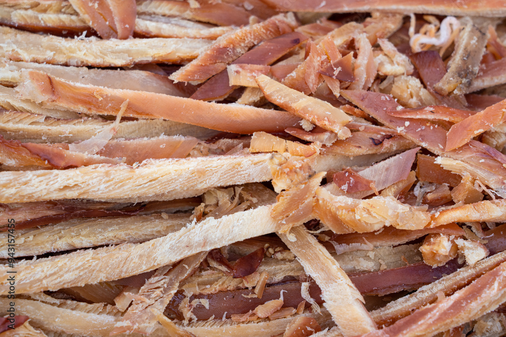 Dried shredded squid background. Dried shredded squid background.
