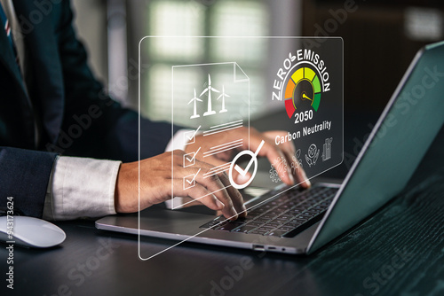 Platform for trading renewable energy certificates. Businessman using computer and virtual screen. Concept of renewable energy use and renewable energy trading on user-friendly platform.