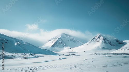 Snow-Covered Mountain Peaks in Winter Landscape