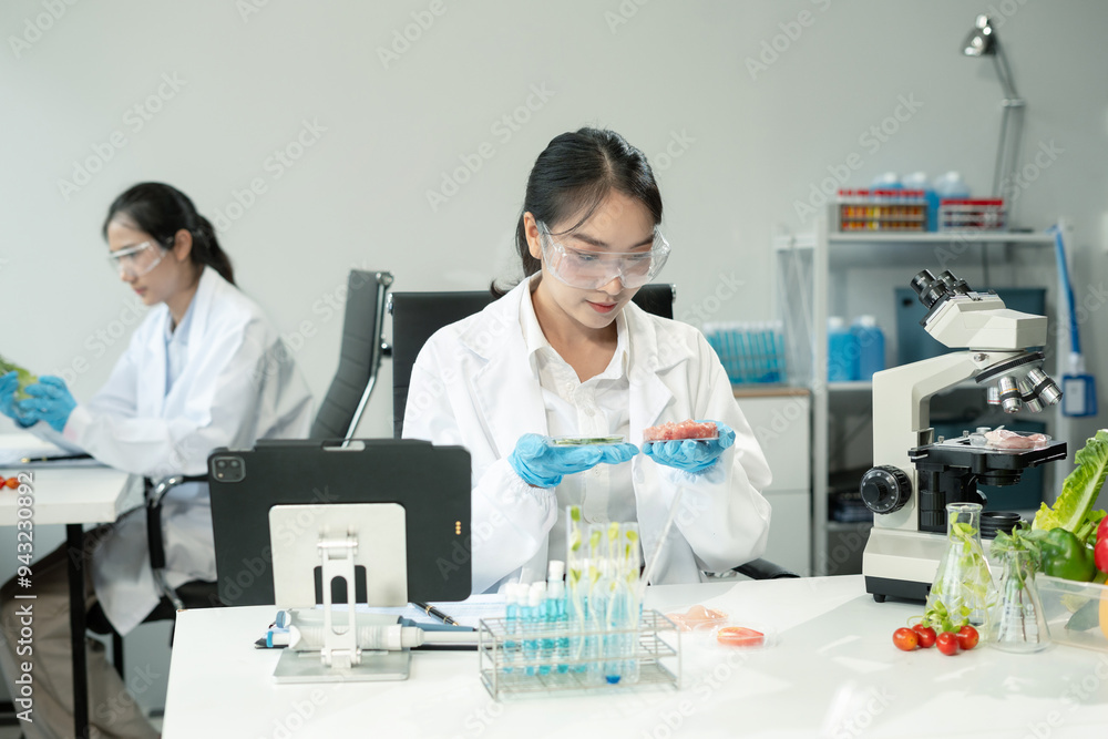 Team Microbiologists Analyzing Molecular Samples in Advanced Food Science Laboratory, Dietitian food and medicine. Team Microbiologists Analyzing Molecular Samples in Advanced Food Science Laboratory, Dietitian food and medicine.