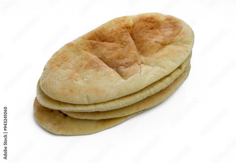 Pita on a kitchen set, on a white background, top view, flat lay Pita on a kitchen set, on a white background, top view, flat lay