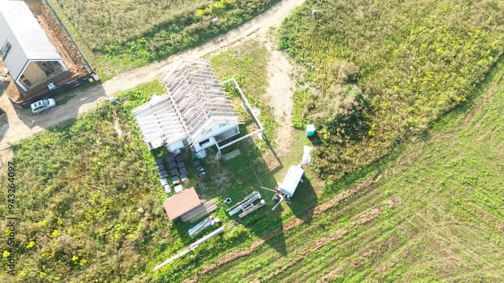 Unfinished rural home seen from above Unfinished rural home seen from above