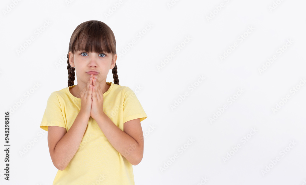 Cute kid putting his hands together as if begging for something, sadness feel. Cute kid putting his hands together as if begging for something, sadness feel.