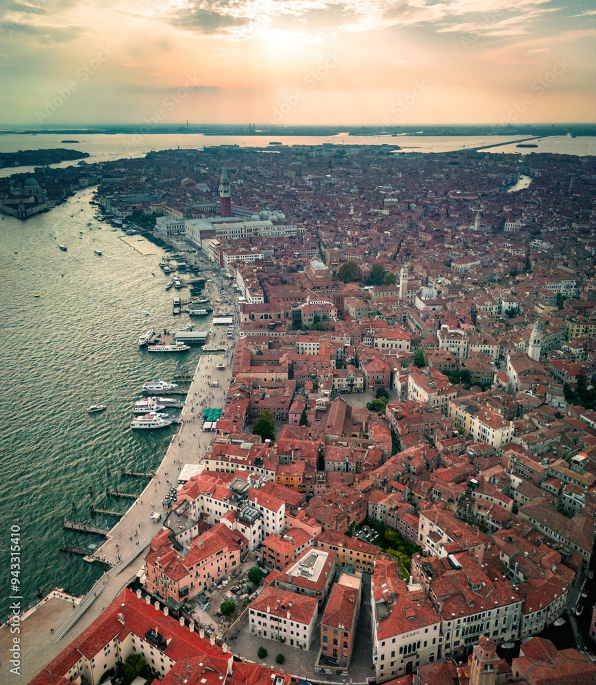 Naklejka premium Aerial view over Venice in Italy at the sunset