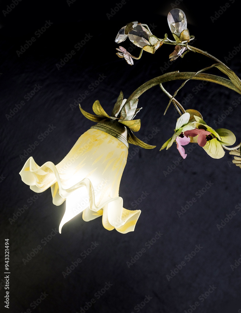 Chandelier lamp with flowers and metal, Bohemian glass Beautiful exquisite natural motifs with crystals on a black background isolate