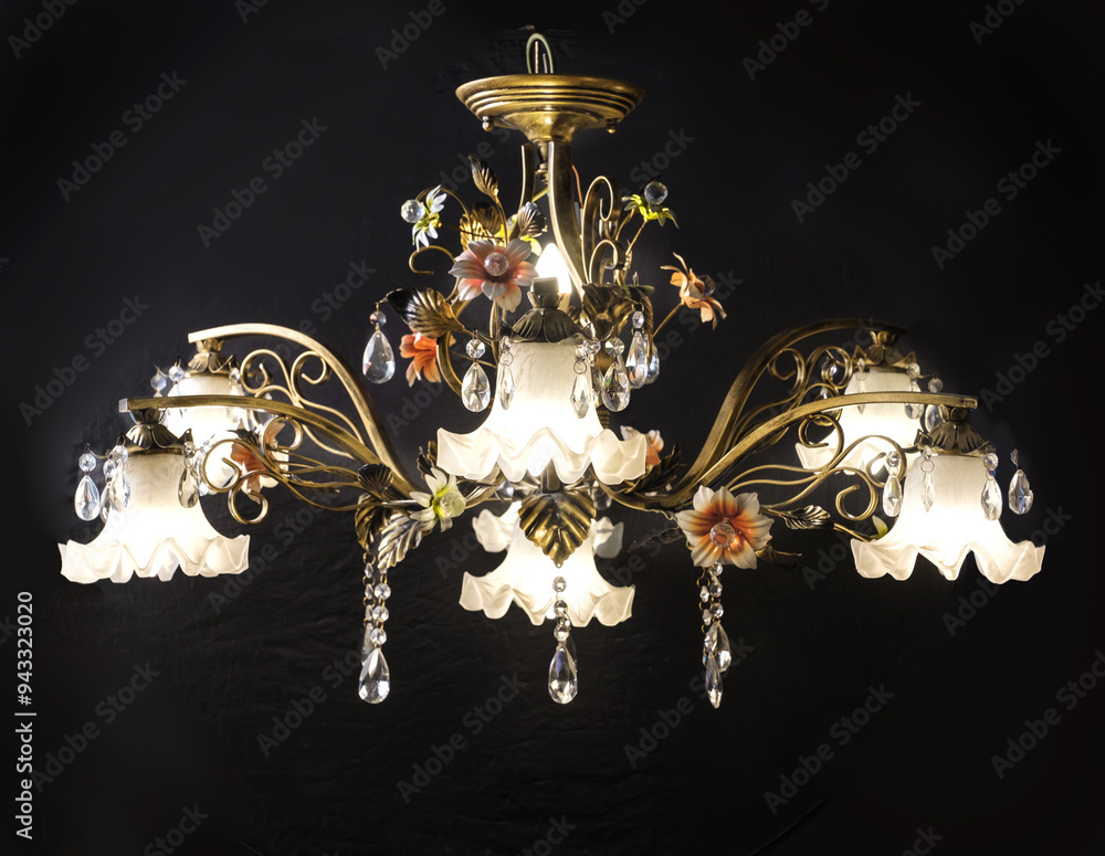Chandelier lamp with flowers and metal, Bohemian glass Beautiful exquisite natural motifs with crystals on a black background isolate