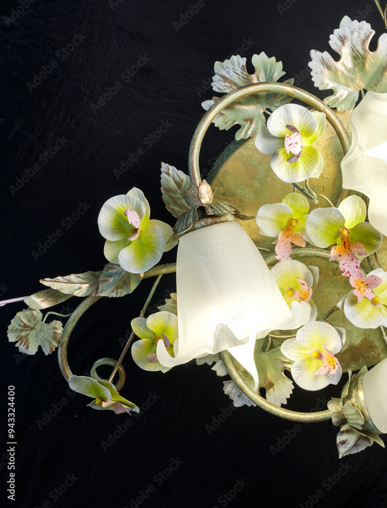 Chandelier lamp with flowers and metal, Bohemian glass Beautiful exquisite natural motifs with crystals on a black background isolate