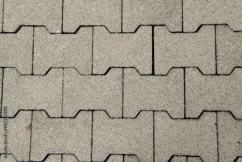 Fotografie texture interlocking bricks for flooring, in interconnected concrete offer a functional and weather-resistant design