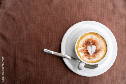 Top view of Latte coffee or cappuccino coffee in white cup with beautiful tree latte art