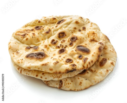 Baked Indian, asian, pakistani, naan bread, roghni naan, on white background
