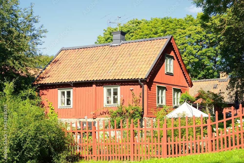 Idyllic summerhouse with a beautiful garden. Idyllic summerhouse with a beautiful garden.