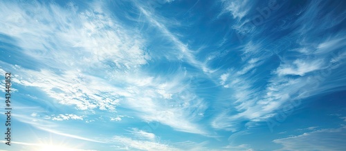 Fototapeta Naklejka Na Ścianę i Meble -  Beautiful blue sky with thin white clouds perfect for a copy space image