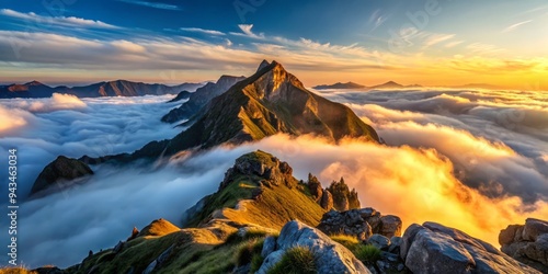 Dramatic dawn landscape of rugged mountain edge meeting serene blue sky with misty fog rolling in, captured in high contrast with warm golden light and deep shadows.