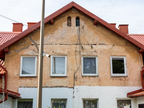 shabby facade of urban house in Zelenogradsk town photo