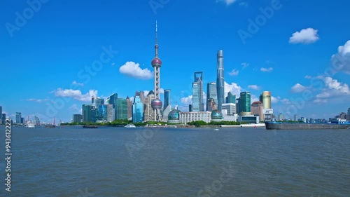 Shanghai, China - August 17th 2024:4k time lapse of Lujiazui district and Huangpu river in sunny day photo