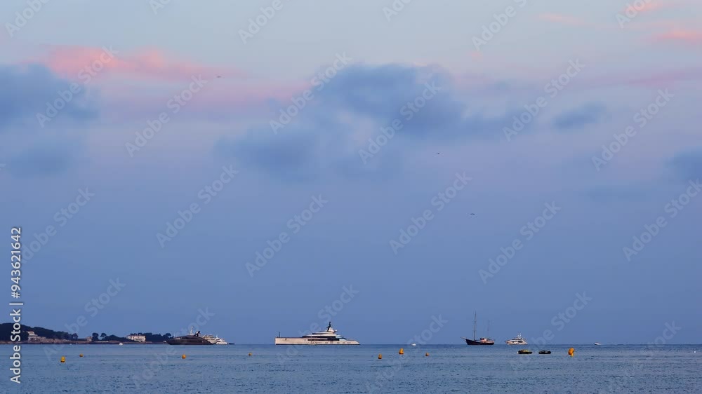 Boats moving on the sea in the evening in Cannes, France