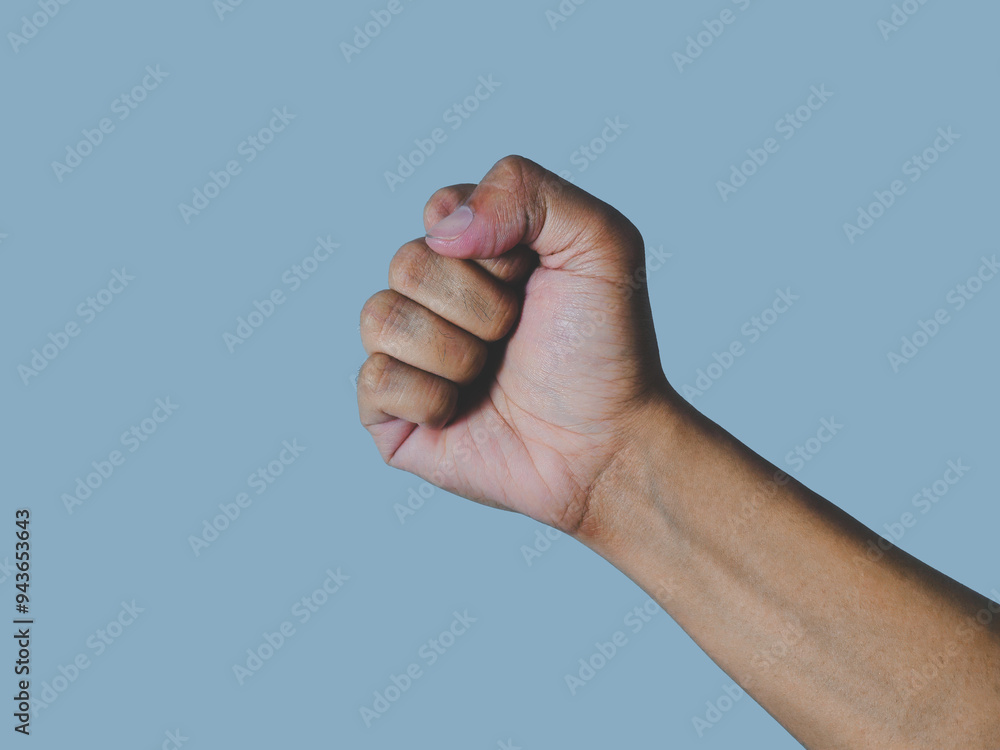 hand fist gesture on blue background hand fist gesture on blue background