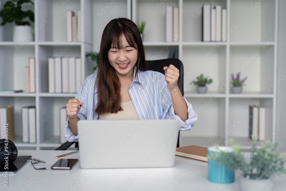 Joyful Woman Celebrating Achievement During Online Study Joyful Woman Celebrating Achievement During Online Study