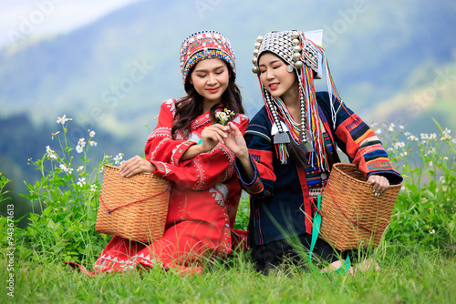 Fényképezés portrait of asian female wearing tradition tribal dress holding basket in the na