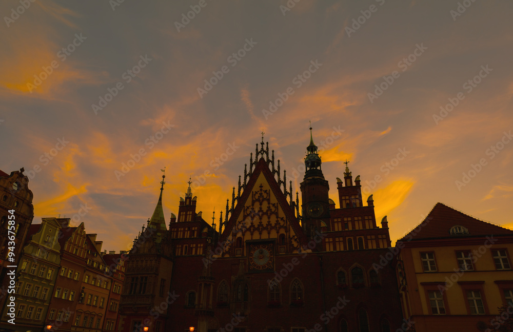 Fototapeta premium town hall in wroclaw on background sunset sky