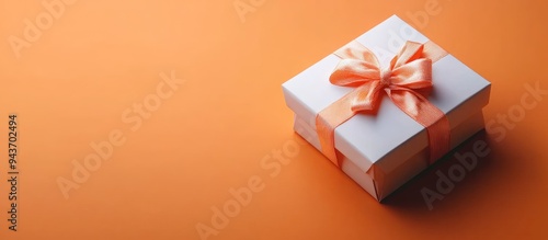 Gift box tied with a bow on...