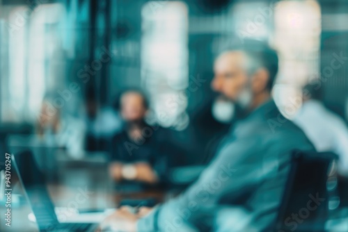 Blurry boss trains senior and newbie office workers on computers.