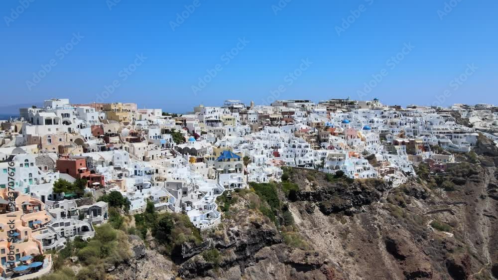 Flight around of Three Blue Domes church in Oia town on Santorini island, Greece
Flight around of Three Blue Domes church in Oia town on Santorini island, Greece